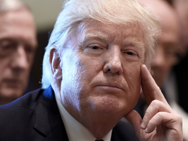 NORC poll: Most think Trump meddled in Russia probe