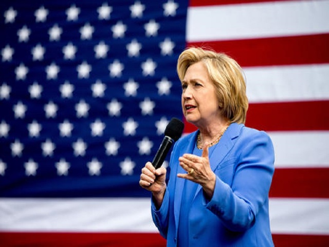 Clinton woos Kentucky voters day before primary