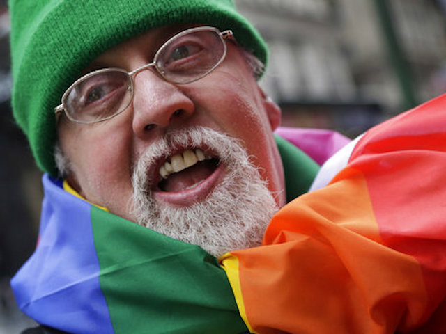 Creator of rainbow flag, symbol of gay rights, dies at 65