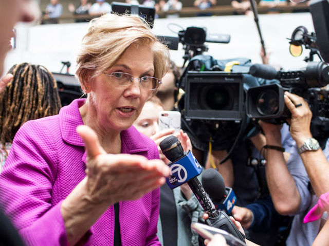 Warren says she'll think about presidential run after the midterms